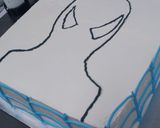 A picture of step 8 of Simple spider man cake.