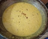 A picture of step 4 of Rava besan dry fruit laddu.