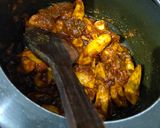 A picture of step 3 of Arbi in gravy.