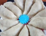 A picture of step 11 of Pitha (Bengali Coconut-Stuffed Pitha).