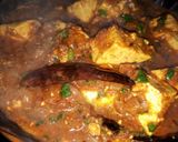 A picture of step 2 of Paneer masala with Parantha and white butter.