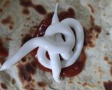 A picture of step 4 of Leftover rajma chawal taco 🌮.