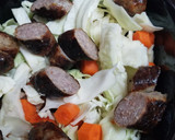 A picture of step 2 of Slow Cooker Bratwurst and Cabbage.