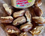 A picture of step 1 of Vegan Stuffed Dates with Peanut Butter and Dark Chocolate with Sea Salt.