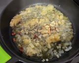 Foto del paso 3 de la receta: Tellinas, con cebolla caramelizada y sake
