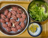 A picture of step 1 of Stir-Fried Bell Peppers with Sausage.