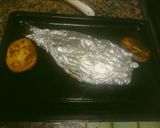 Foto del paso 3 de la receta: Dorada al horno empapelado acompañado con papas y arroz