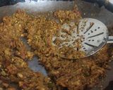 A picture of step 9 of Bharva karele.