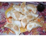 Foto del paso 12 de la receta: Empanadillas con verdeo, jamón, queso y huevo batido