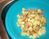 A picture of step 2 of Onion fried potatoes with fish and greens.