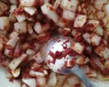 A picture of step 8 of Sardine Empanadas with Tomato and Onion Sauce.