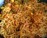 A picture of step 3 of "Schezwan Maggi with Baked Bread Bowl".