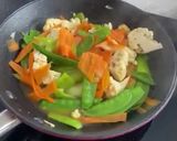 A picture of step 2 of Pan Seared Salmon Butter With Stir fried Veggies.