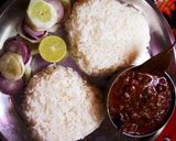 A picture of step 6 of Ghooghni with boiled rice.