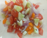 A picture of step 2 of Simple tomato cucumber salad.