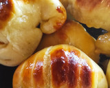 Foto del paso 7 de la receta: Medialunas rellenas con membrillo y dulce de leche