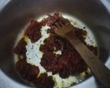 A picture of step 8 of Tumeric rice with sausages, egg curry and salad.