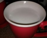 A picture of step 1 of Milk with rooh afza.
