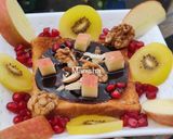 A picture of step 4 of Nutti Fruitti Chocolate Toast.