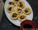 A picture of step 18 of Raisins-Pistachio Baklava.