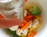 A picture of step 2 of Baked Cauliflower Broccoli.