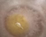 A picture of step 3 of Double tadka lahsuni Palak khichdi.
