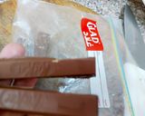 A picture of step 3 of Kitkat Layered cream cheese Parfait.