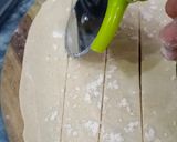 A picture of step 3 of Roll paratha in desi ghee.