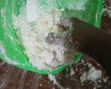 A picture of step 5 of Chocolate with ground nuts cake covered in fondant.