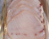 A picture of step 2 of Sword fish asparagus twists.