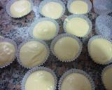 Foto del paso 3 de la receta: Cupcakes de nata rellenos de crema de limón