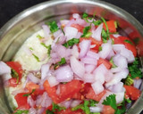 A picture of step 3 of Moong Dal Appe with vegetables.