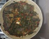 A picture of step 3 of Simple tilapia in a bed of green veggies.