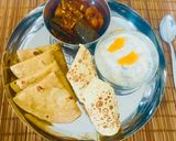 A picture of step 12 of Mini Kathiyawadi Meal- Bharela (Ravaya)Ringana- Bateta nu Shaak-Fulka Rotli😋.
