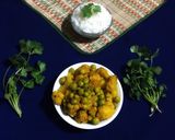 A picture of step 6 of Gobhi Matar Curry.