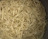 A picture of step 9 of Chinese noodles.