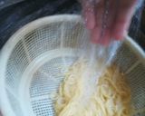A picture of step 2 of Spaghetti Nest with Drumsticks.