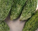 A picture of step 1 of Crispy Karela (bitter gourd).
