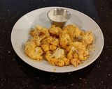 A picture of step 8 of Romano Cheese Crusted Spicy Cauliflower Bites.