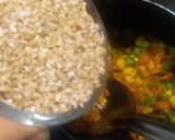 A picture of step 3 of Vegetable Oats Daliya.