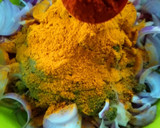 A picture of step 5 of Ragi mudda with mutton curry.