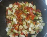 A picture of step 3 of Lauki coconut masala.