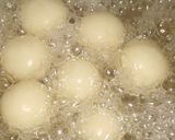 A picture of step 9 of Tricolour suji coconut laddu.
