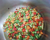 Foto del paso 2 de la receta: Arroz integral con guisantes