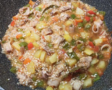 Foto del paso 2 de la receta: Arroz con pollo y calamares. Muy fácil
