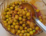 A picture of step 6 of Karonda pickle.