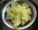 A picture of step 1 of Potato mash with onion and cheese.