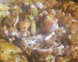 A picture of step 3 of Gobhi with raw turmeric.