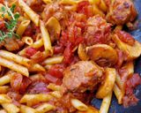 Foto del paso 7 de la receta Macarrones con butifarra, champiñones y tomate