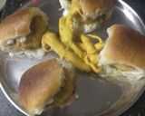 A picture of step 6 of Vadapav with green spicy chutney.